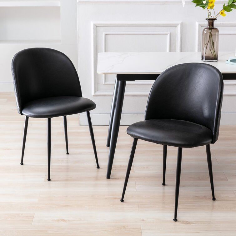 Black tufted dining online chairs